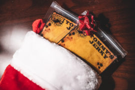 Red stocking with jerky inside and red bow