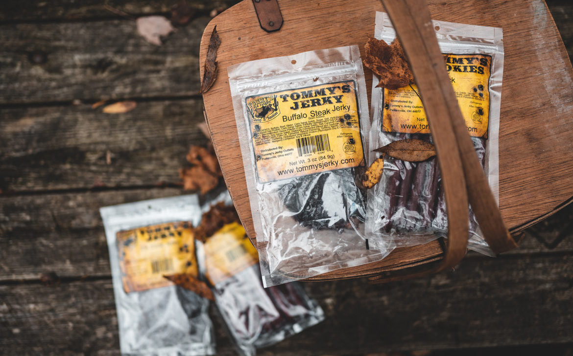 Jerky on wooden basket on table