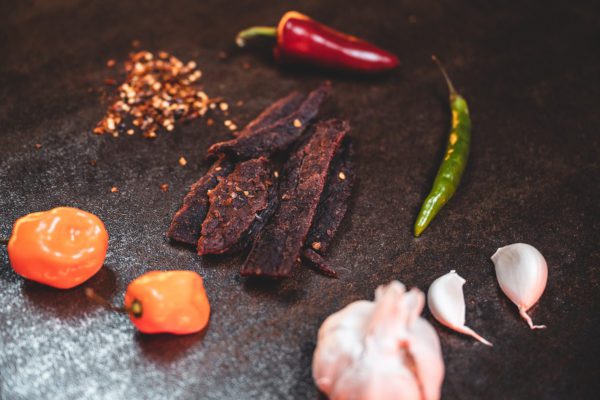 Beef jerky with garlic, peppers, and spices