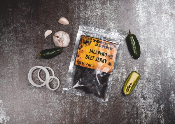 Jalapeno beef jerky in bag with onion, garlic, and jalapenos