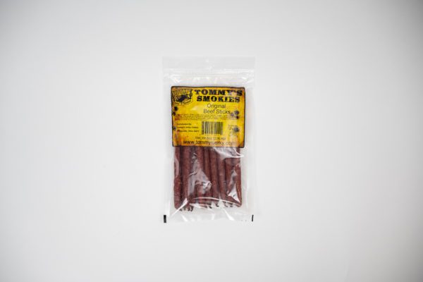 Original beef stick in bag on white background