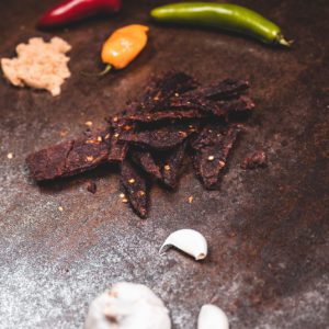 Beef jerky with peppers, garlic, and brown sugar