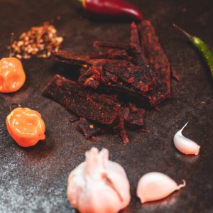 Beef jerky with garlic, spices, and peppers